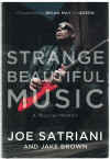 Strange Beautiful Music A Musical Memoir by Joe Satriani Jake Brown foreword by Brian May (2014) ISBN 9781939529640 
used book for sale in Australian second hand book shop